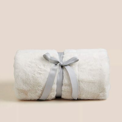 M&S has nailed this winter's fluffy bedding trend with this super-soft faux fur throw – but at only £29.50, it's selling out fast