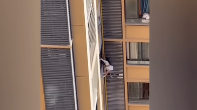Tragic Near-Fall: Mistress Clings To 10th Floor Window While Fleeing Vengeful Wife