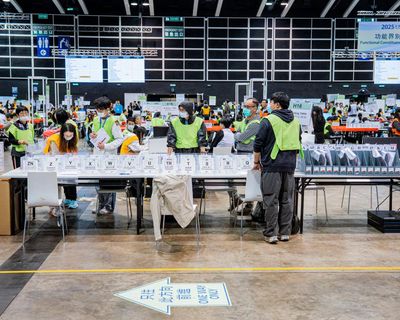 Near-record low election turnout in Hong Kong amid discontent over apartment fire