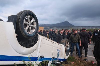Protesting Greek farmers swarm onto apron area of international airport on Crete