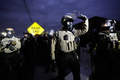 Anti-ICE protest hit with tear-gas after snowballs thrown at agents in Illinois