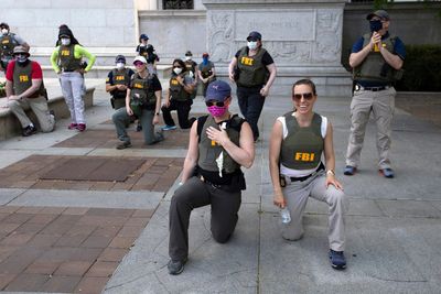 FBI agents sue after being fired for kneeling at George Floyd protest