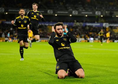 Fernandes at the double as Manchester United ease past Wolves amid fan unrest