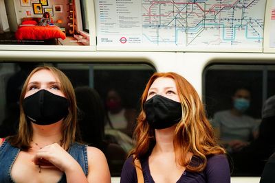 'Stay at home' and don't go on Tube if you have flu-like symptoms, says London NHS chief as virus sweeps city