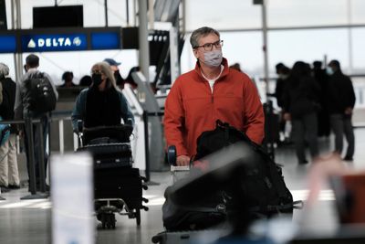 NHS boss calls for people to wear masks in public as ‘tidal wave’ of flu strikes