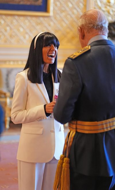 Claudia Winkleman beams as she receives MBE from the King ahead of Strictly Come Dancing exit