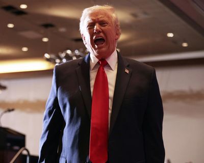 Trump rails on affordability ‘hoax’ and flings racist attacks in rally-style speech