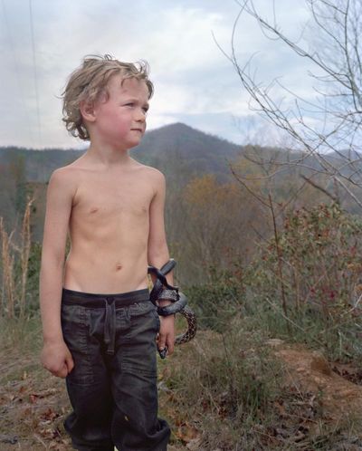 Snakes alive! A boy with a serpent in the Appalachians: Hannah Modigh’s best photograph