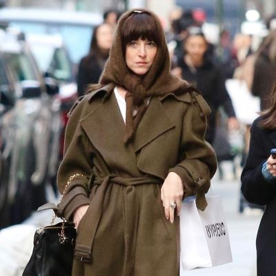 Dakota Johnson Just Stepped Out in This Winter's Must-Have Accessory—A Knitted Triangle Scarf