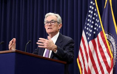 Fed cuts interest rates by a quarter point amid apparent split over US economy