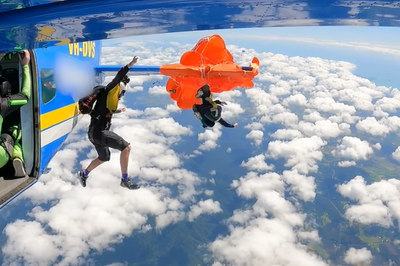 Skydiver’s parachute gets caught on plane’s wing at 15,000ft as jump goes horribly wrong
