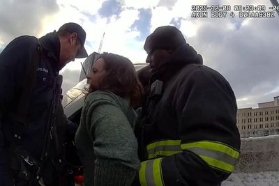 Dramatic moment shows cops rescuing FBI agent from car dangling from overpass