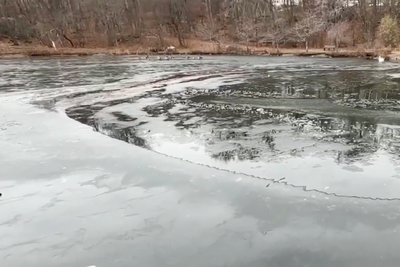 Firefighters describe terrifying moment teenage girl broke though ice and plunged into 30-foot deep Massachusetts lake