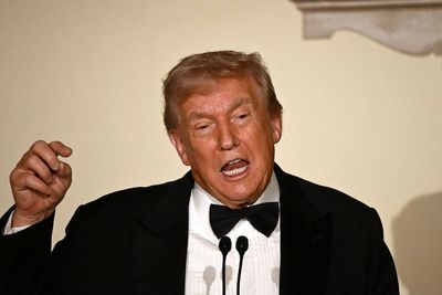 Trump is pictured with heavy makeup on the back of his hand at White House Congressional Ball