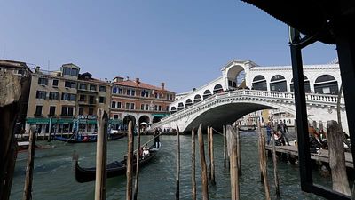 Woman crashes stolen boat into Venice's historic Rialto Bridge