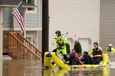 Flooding remains threat in Pacific north-west as Washington declares emergency