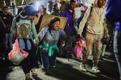 Believers of Our Lady of Guadalupe flock to her Mexico City shrine, in photos
