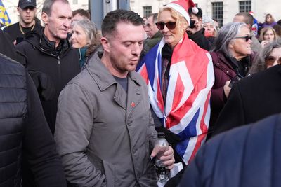 Tommy Robinson closes Unite the Kingdom ‘Christmas service’ after police keep protesters apart– live