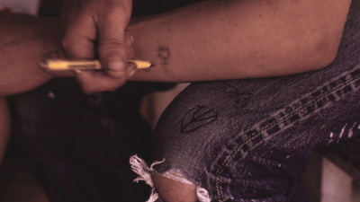 How are 'traumatic tattoos' made, and do you have one?