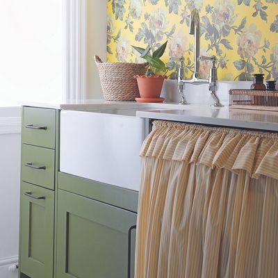 I immediately bought Dunelm's new £15 kitchen cupboard curtain – it's the answer to a clutter-free cooking space