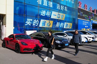 High-end car sales sink in China as its economy slows, taking a toll on European automakers