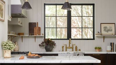 A 1895 Victorian Apartment Is Taken from Traditional to Transitional with Secret Sliding Doors, Smoky Black Paint, and Ancient Family Heirlooms