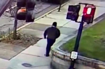 Police release footage of suspect in Brown University shooting as manhunt continues