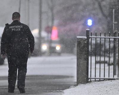 Brown University shooting: person of interest in custody is in his 20s, police chief confirms – as it happened