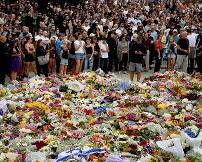 Bondi beach shooting: vigils held for victims as more than A$1m raised for man who tackled shooter – as it happened