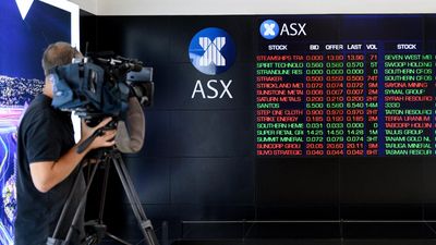 ASX shares slide to seven-year low after damning report