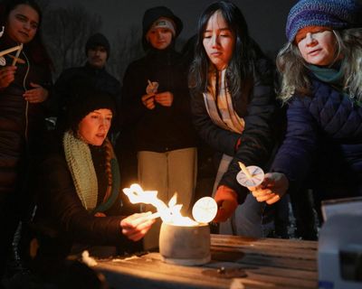 Brown university shooting: police release more videos of person of interest as FBI offers reward – as it happened