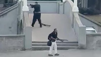 Gunmen linked to Islamic State as flags, bombs found