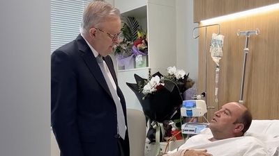 From his hospital bed, Bondi hero feted by leaders