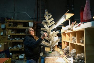 Americans like artificial Christmas trees even though few are made in US and prices are up