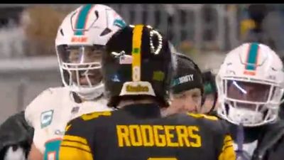 Aaron Rodgers Directs Taunting Dolphins Sideline to Scoreboard in Funny Comeback