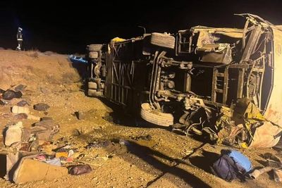 Bus crash kills 13 and injures over a dozen on highway in central Iran