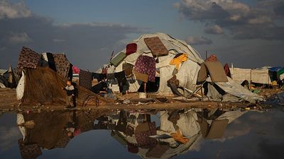 Gaza's displaced struggle with heavy rain and cold weather in fragile tents