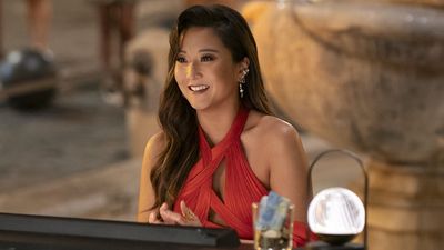 Ashley Park's Red Corset Dress At The Actual Parisian Emily In Paris Premiere Is Giving Holiday And High Fashion At The Exact Same Time