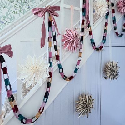 This simple and easy update turns the nostalgic paper chain into elevated Christmas decor – ‘velvet instantly drags it into grown-up territory’