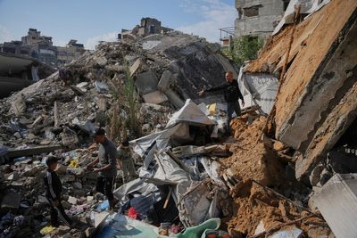 Gaza families struggle to recover from days of torrential rains that killed 12 people