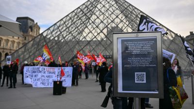 Louvre partially reopens despite staff vote to carry on strike
