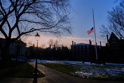 Brown University to release early decision notices as the search goes on for a shooting suspect