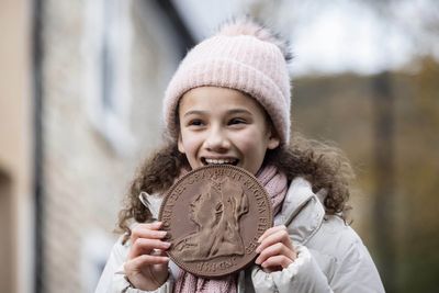 200th banking hub opens with chocolate coins marking the event