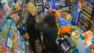 Moment London shopkeeper armed with shovel bravely takes on thug who ‘doused shop with petrol and shouted 'I’ll set you on fire'