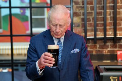 Charles plays barman and pulls the ‘perfect’ pint of Guinness