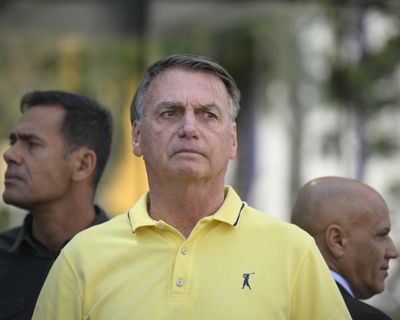 Brazilian president vows to veto bill cutting Jair Bolsonaro’s prison term