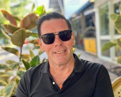 Former Townsville mayor claimed to have epilepsy in endorsement of wellness bracelet sold by business linked to his partner