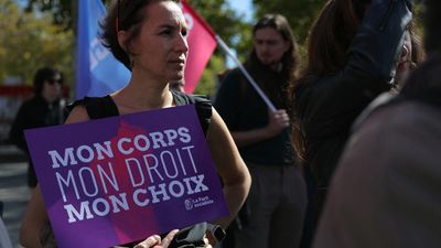 French parliament unanimously exonerates women punished for abortion