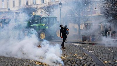 Farmers clash with police near European parliament in Brussels