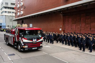 Hong Kong mourns firefighter killed in city's deadliest fire in decades